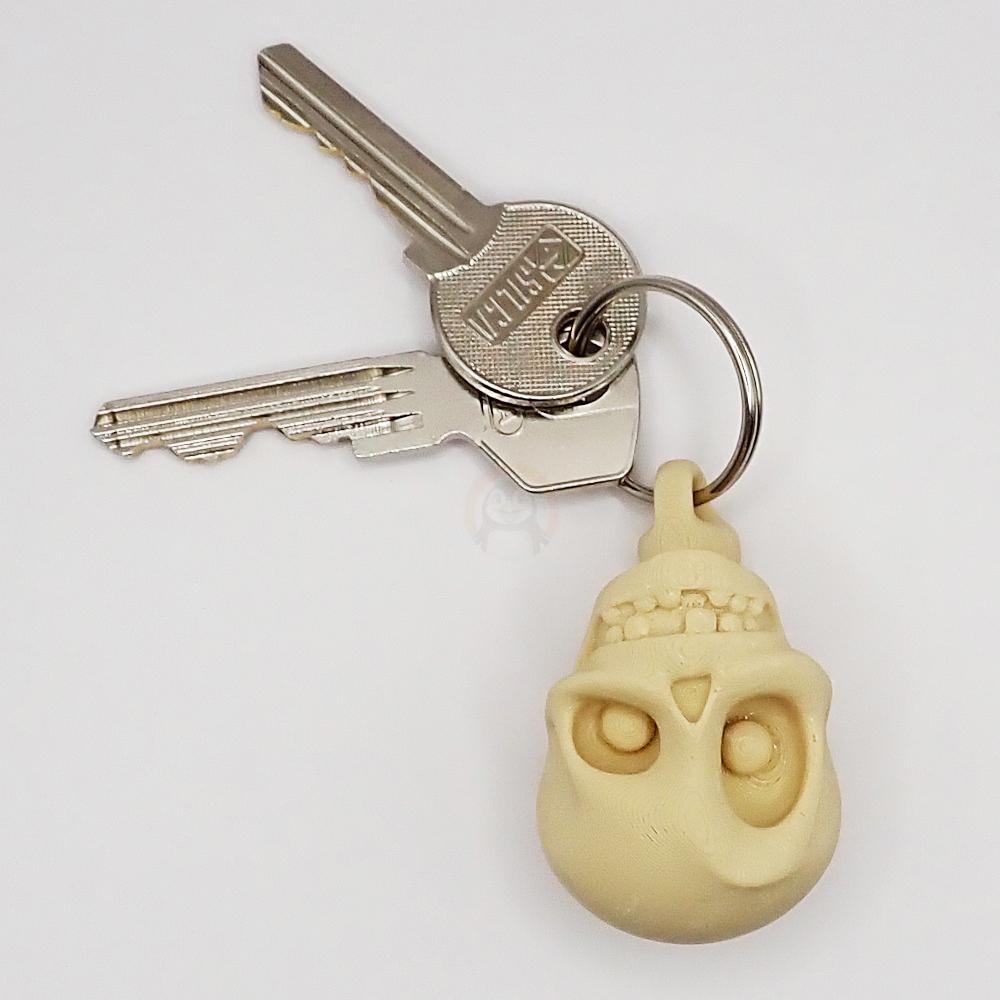 Přívěsek na klíče Lebka páteř