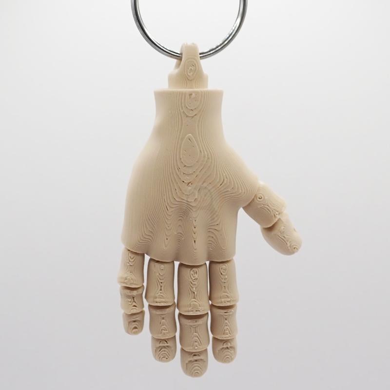 Přívěsek na klíče Ruka Lidská