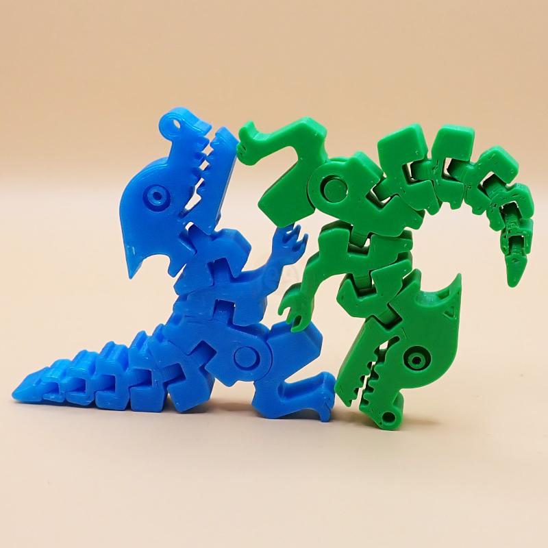 Přívěsek na klíče Šťastný dinosaurus