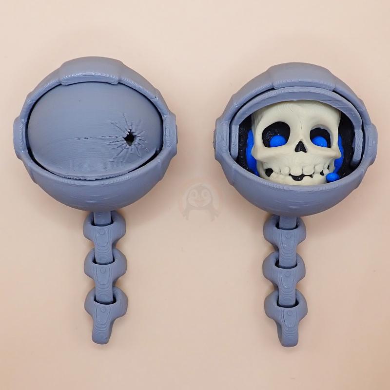 Přívěsek na klíče Lebka Astronauta páteř