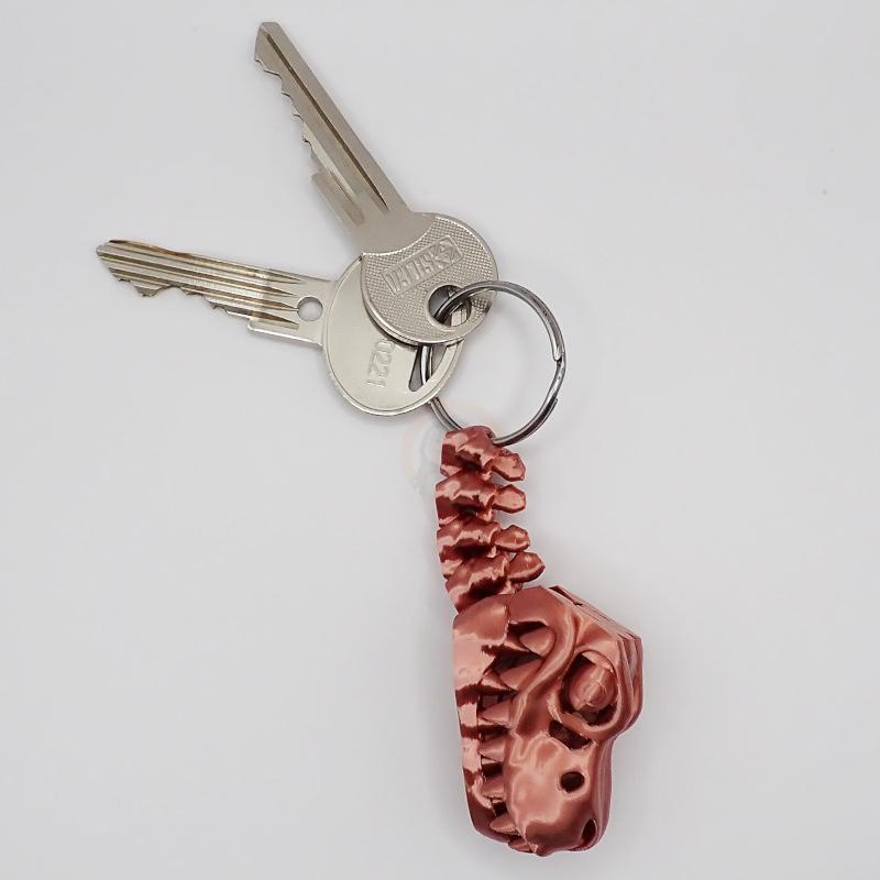 Přívěsek na klíče Tyranosaurus s očima