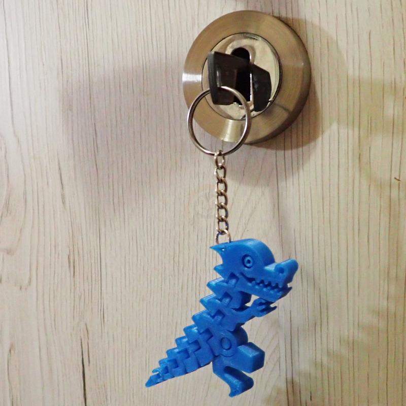 Přívěsek na klíče Šťastný dinosaurus