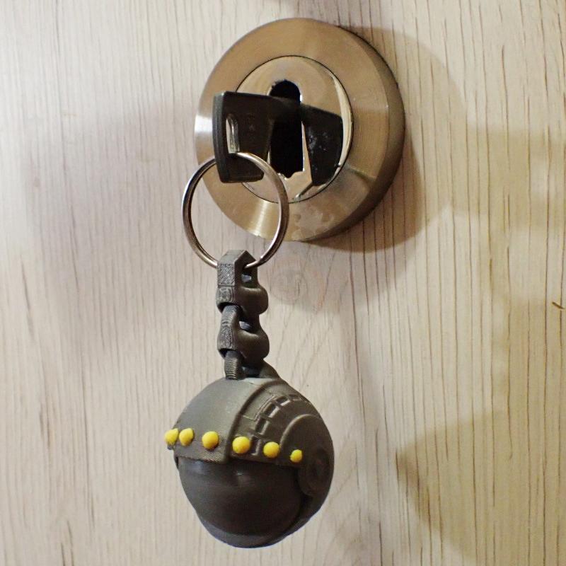 Přívěsek na klíče Oko robota