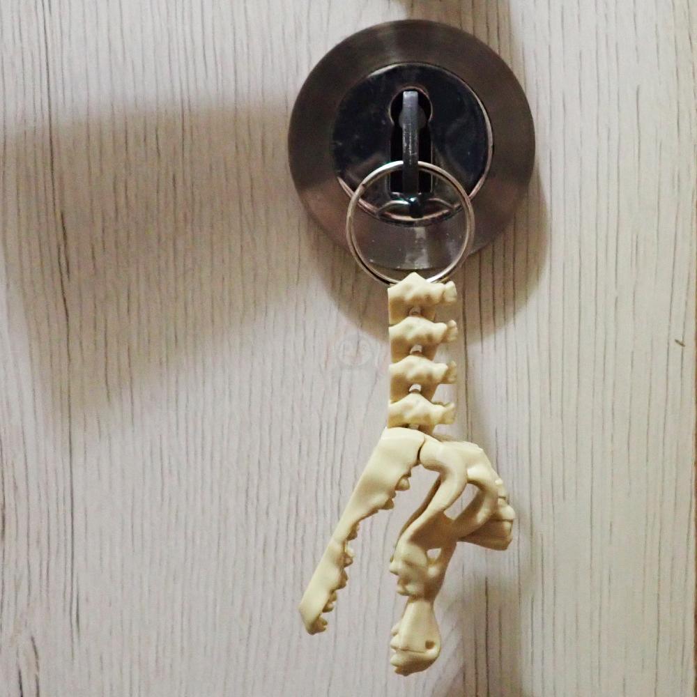 Přívěsek na klíče Spinosaurus