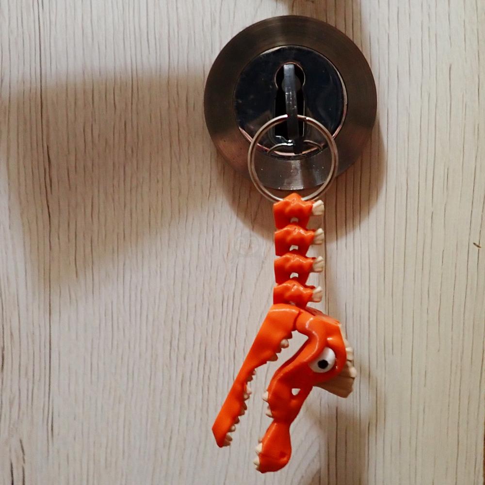 Přívěsek na klíče Spinosaurus s očima