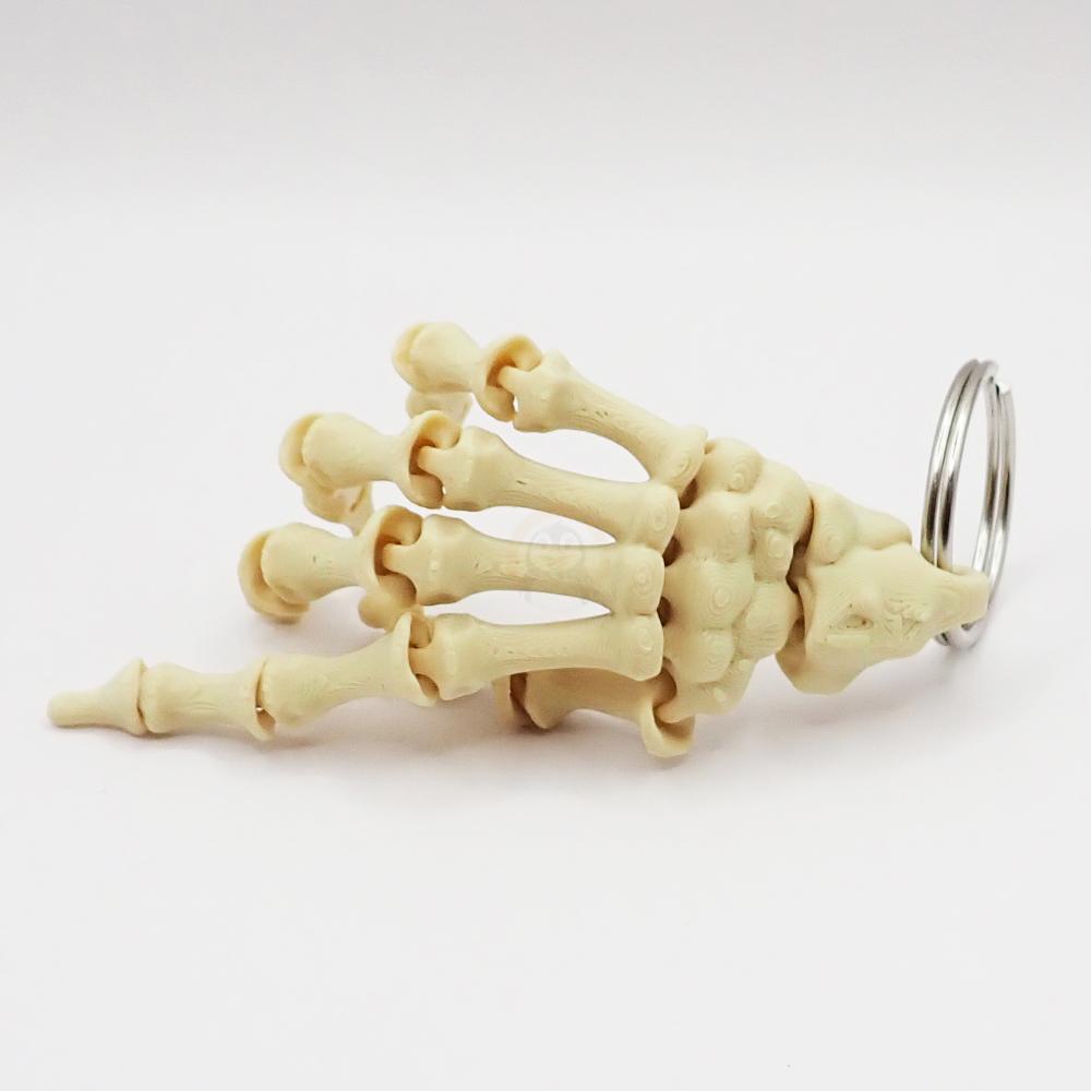 Přívěsek na klíče Ruka Kostlivce