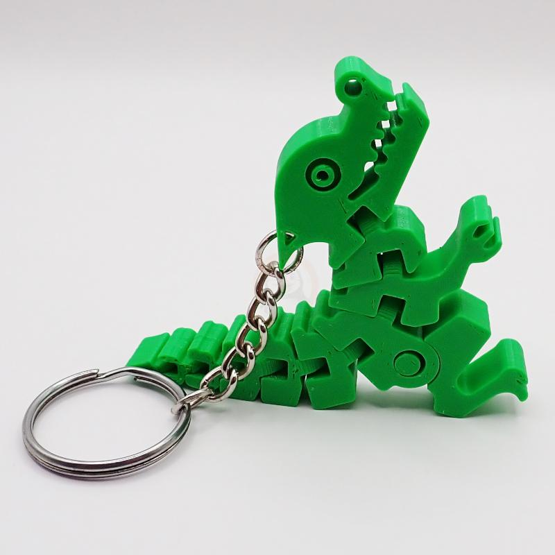 Přívěsek na klíče Šťastný dinosaurus