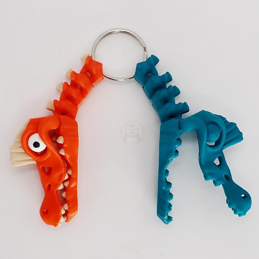 Přívěsek na klíče Spinosaurus s očima