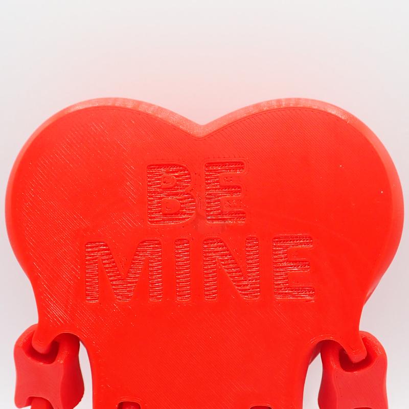 Srdce Herbert s nápisem "BE MINE"