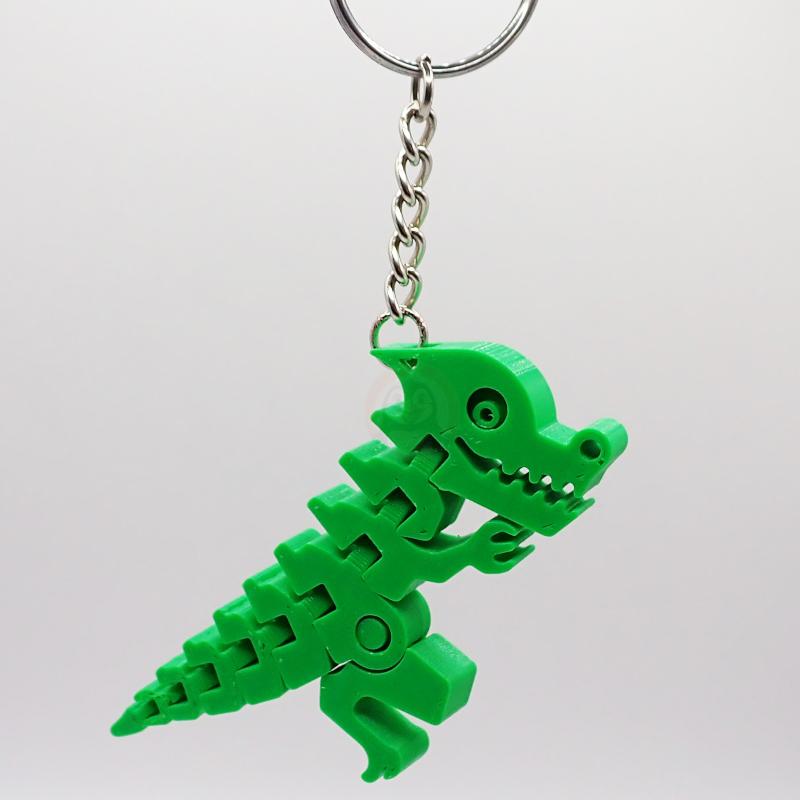 Přívěsek na klíče Šťastný dinosaurus